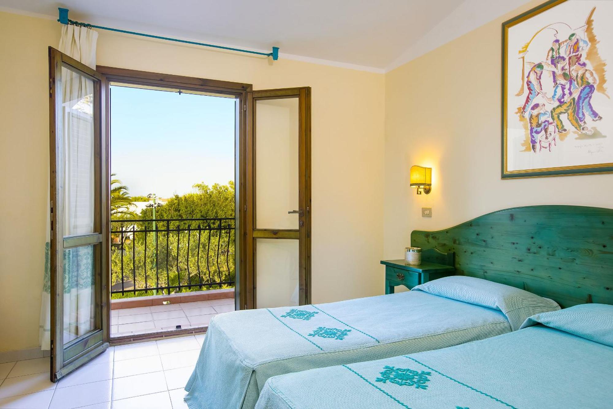 Alba Dorata Resort Cala Liberotto Bagian luar foto
