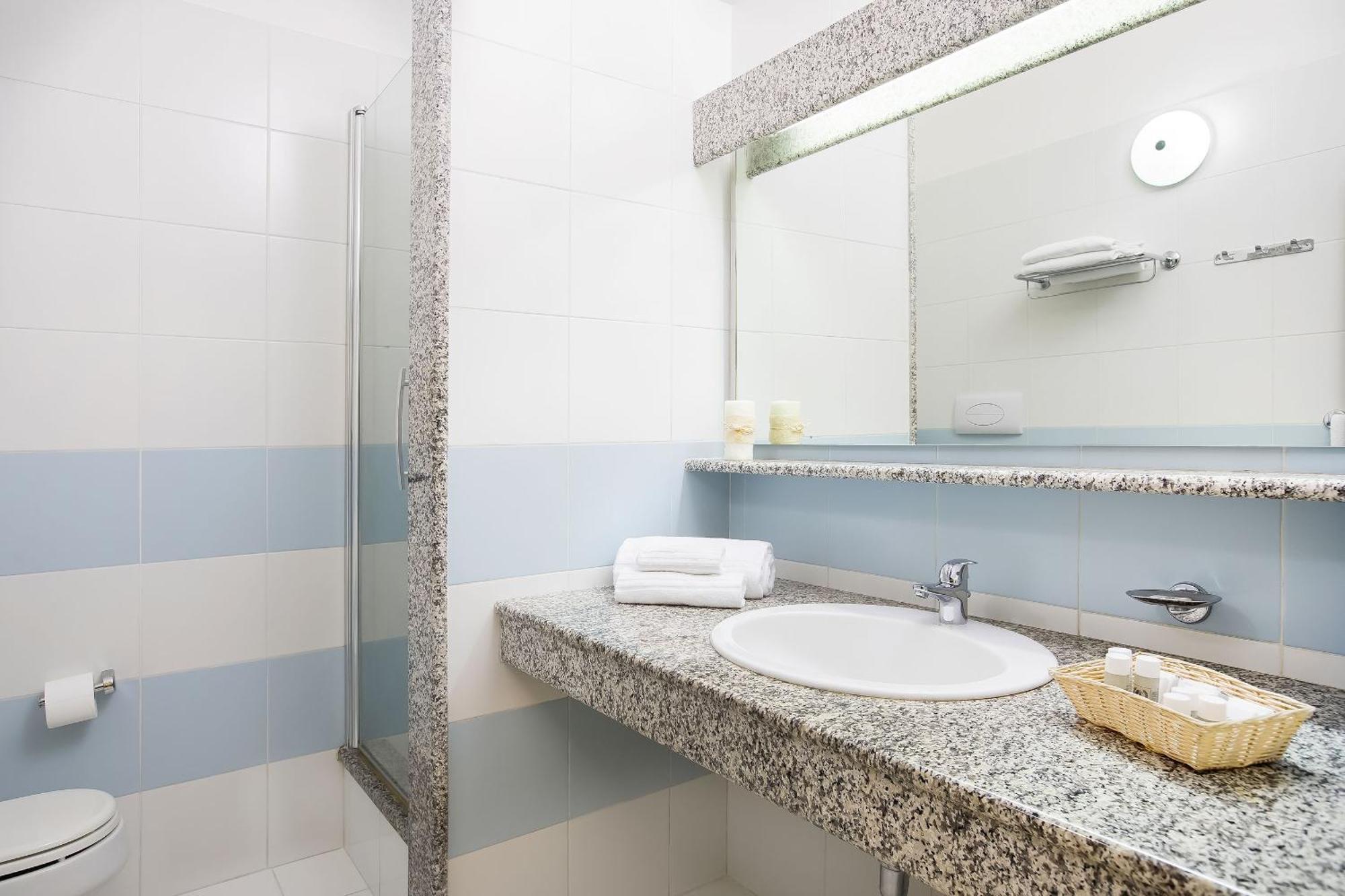 Alba Dorata Resort Cala Liberotto Bagian luar foto