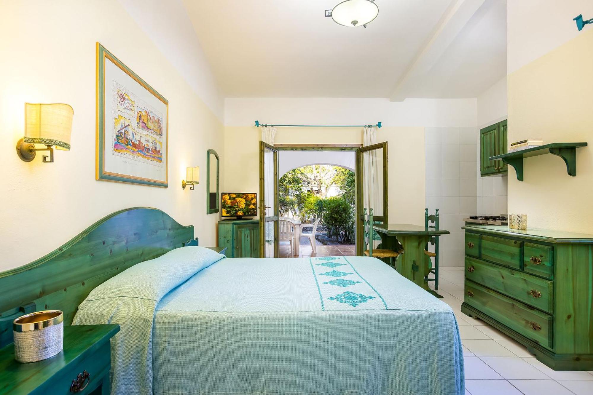 Alba Dorata Resort Cala Liberotto Bagian luar foto