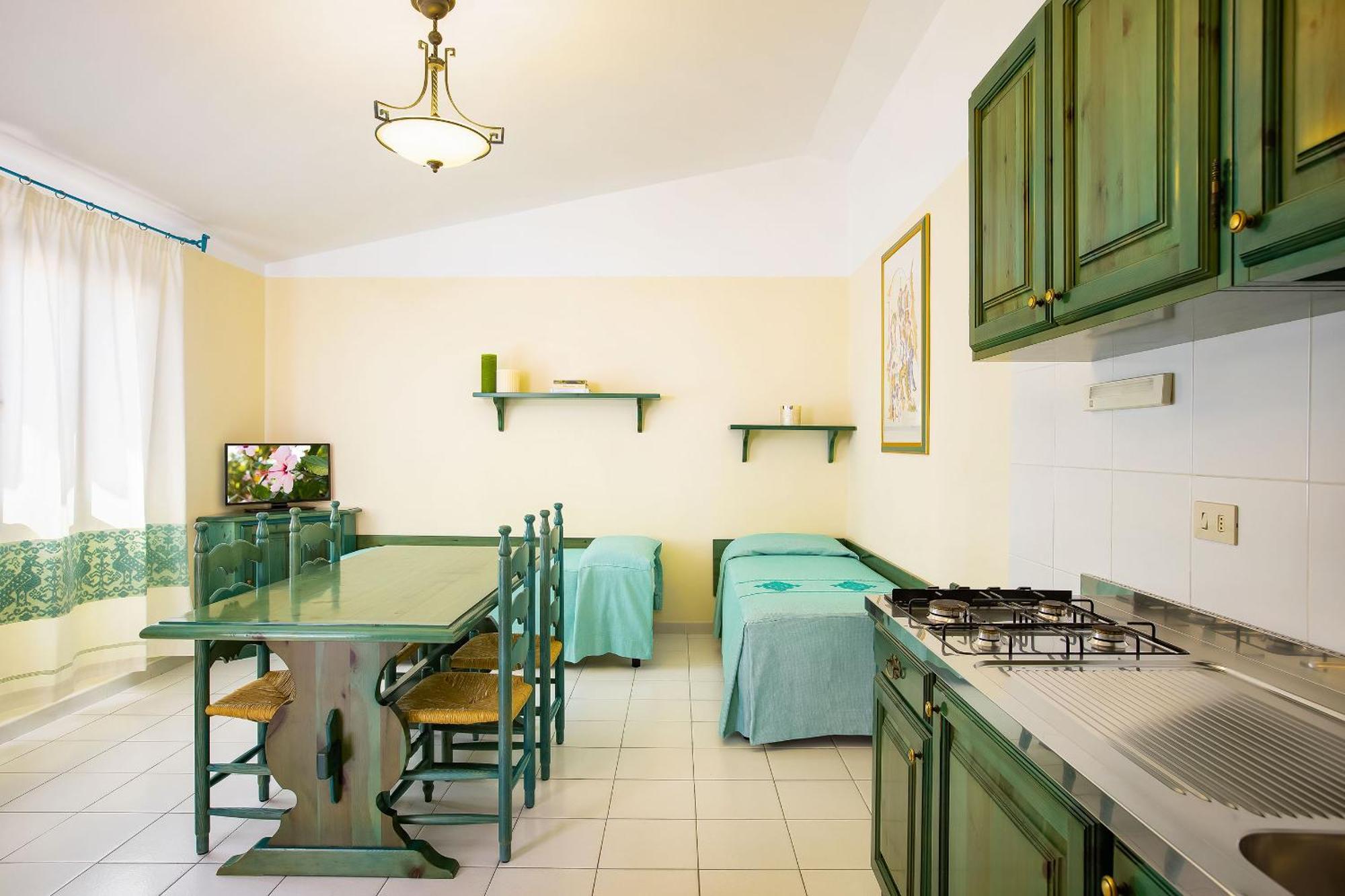 Alba Dorata Resort Cala Liberotto Bagian luar foto