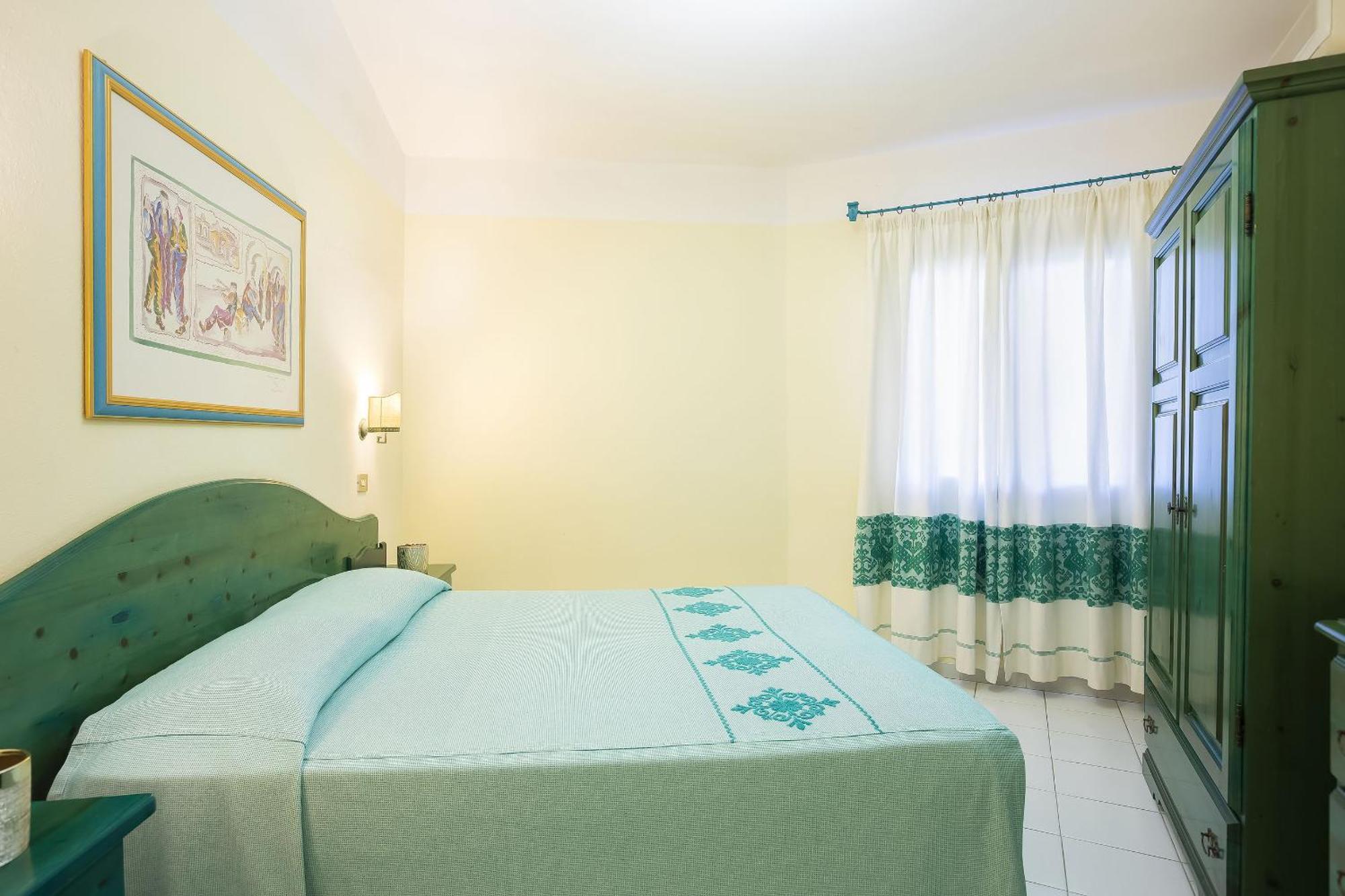 Alba Dorata Resort Cala Liberotto Bagian luar foto