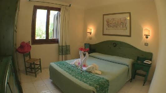 Alba Dorata Resort Cala Liberotto Bagian luar foto